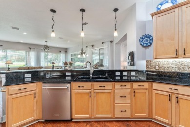 GOLF COURSE home with tons of updates and upgrades located in on Eagle Ridge At Spruce Creek Country Club in Florida - for sale on GolfHomes.com, golf home, golf lot
