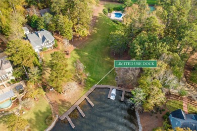 Charming lake access home situated on a unique lot that offers on Reynolds Lake Oconee - The Oconee in Georgia - for sale on GolfHomes.com, golf home, golf lot