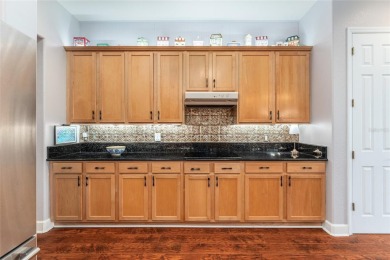 GOLF COURSE home with tons of updates and upgrades located in on Eagle Ridge At Spruce Creek Country Club in Florida - for sale on GolfHomes.com, golf home, golf lot
