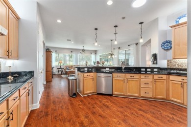 GOLF COURSE home with tons of updates and upgrades located in on Eagle Ridge At Spruce Creek Country Club in Florida - for sale on GolfHomes.com, golf home, golf lot