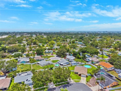 Welcome to your slice of paradise in the coastal city of Largo! on Largo Golf Course in Florida - for sale on GolfHomes.com, golf home, golf lot