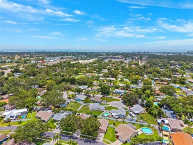 Welcome to your slice of paradise in the coastal city of Largo! on Largo Golf Course in Florida - for sale on GolfHomes.com, golf home, golf lot