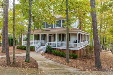 Charming lake access home situated on a unique lot that offers on Reynolds Lake Oconee - The Oconee in Georgia - for sale on GolfHomes.com, golf home, golf lot