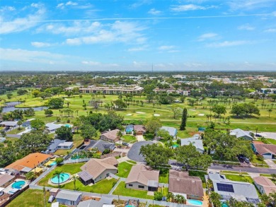 Welcome to your slice of paradise in the coastal city of Largo! on Largo Golf Course in Florida - for sale on GolfHomes.com, golf home, golf lot