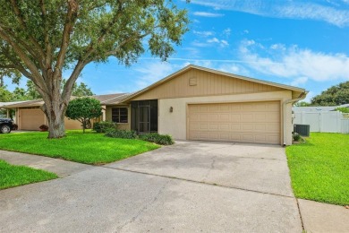 Welcome to your slice of paradise in the coastal city of Largo! on Largo Golf Course in Florida - for sale on GolfHomes.com, golf home, golf lot