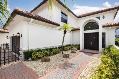Located in the highly sought after & gated Boca Grove Community on Boca Grove Golf and Tennis in Florida - for sale on GolfHomes.com, golf home, golf lot