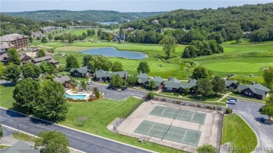 Step into the charm of true log home living in the prestigious on The Club At Old Kinderhook in Missouri - for sale on GolfHomes.com, golf home, golf lot