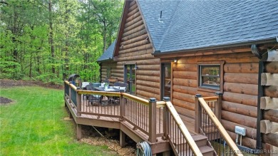 Step into the charm of true log home living in the prestigious on The Club At Old Kinderhook in Missouri - for sale on GolfHomes.com, golf home, golf lot