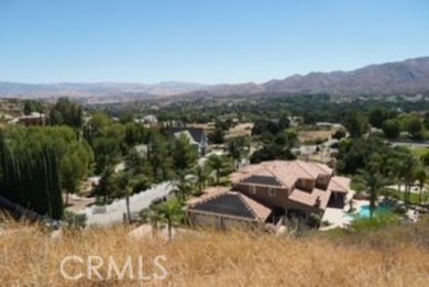 Spectacular mountain views! Nestled in the beautiful hills of on Robinson Ranch - Valley Course in California - for sale on GolfHomes.com, golf home, golf lot