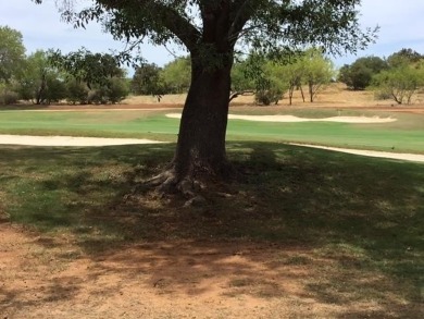 Watch golfers approach the 15th green of Apple Rock Golf Course on Ram Rock Golf Course in Texas - for sale on GolfHomes.com, golf home, golf lot