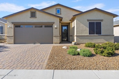 Stunning residence located in Quailwood, featuring a golf course on Quail Wood Greens Golf Course in Arizona - for sale on GolfHomes.com, golf home, golf lot