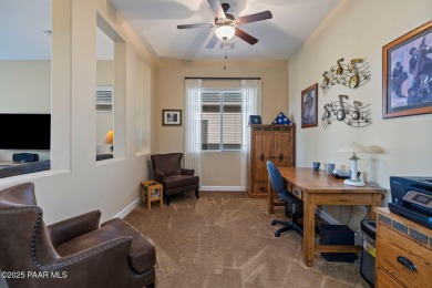 Stunning residence located in Quailwood, featuring a golf course on Quail Wood Greens Golf Course in Arizona - for sale on GolfHomes.com, golf home, golf lot