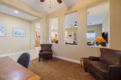 Stunning residence located in Quailwood, featuring a golf course on Quail Wood Greens Golf Course in Arizona - for sale on GolfHomes.com, golf home, golf lot