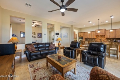 Stunning residence located in Quailwood, featuring a golf course on Quail Wood Greens Golf Course in Arizona - for sale on GolfHomes.com, golf home, golf lot