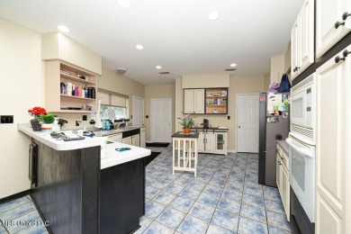 Spacious 5BR/5BA Home in Beautiful Diamondhead, MSDiscover on Diamondhead Country Club in Mississippi - for sale on GolfHomes.com, golf home, golf lot