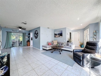 SERENITY AWAITS WITH THIS MOVE-IN READY home with private oasis on Seven Springs Golf and Country Club in Florida - for sale on GolfHomes.com, golf home, golf lot