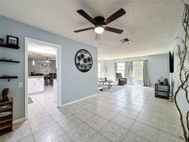 SERENITY AWAITS WITH THIS MOVE-IN READY home with private oasis on Seven Springs Golf and Country Club in Florida - for sale on GolfHomes.com, golf home, golf lot