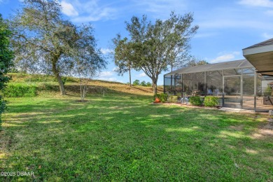 Golf course pool home. NO HOA. Situated on the 13th hole at on Deltona Golf Club in Florida - for sale on GolfHomes.com, golf home, golf lot