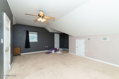 Spacious 5BR/5BA Home in Beautiful Diamondhead, MSDiscover on Diamondhead Country Club in Mississippi - for sale on GolfHomes.com, golf home, golf lot