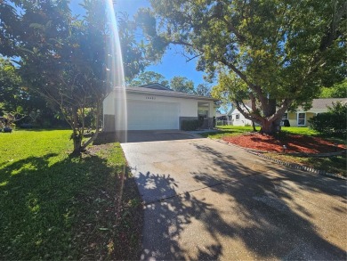 One or more photo(s) has been virtually staged. Nestled in the on Beacon Woods Golf Club in Florida - for sale on GolfHomes.com, golf home, golf lot