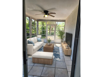 One or more photo(s) has been virtually staged. Nestled in the on Beacon Woods Golf Club in Florida - for sale on GolfHomes.com, golf home, golf lot