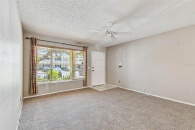 Under contract-accepting backup offers. This 1st floor condo on on On Top Of The World Golf Course in Florida - for sale on GolfHomes.com, golf home, golf lot