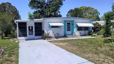 PRICE IMPROVEMENT!!!! This cozy and comfortable GOLF COURSE home on High Point Golf Club, Inc. in Florida - for sale on GolfHomes.com, golf home, golf lot