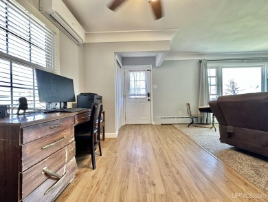 Welcome to this charming ranch home, beautifully updated and on Pine Grove Country Club in Michigan - for sale on GolfHomes.com, golf home, golf lot
