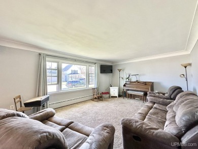Welcome to this charming ranch home, beautifully updated and on Pine Grove Country Club in Michigan - for sale on GolfHomes.com, golf home, golf lot