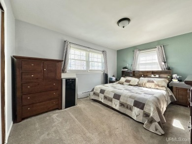 Welcome to this charming ranch home, beautifully updated and on Pine Grove Country Club in Michigan - for sale on GolfHomes.com, golf home, golf lot