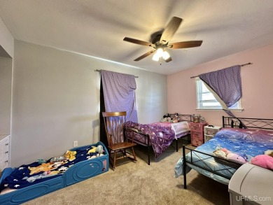 Welcome to this charming ranch home, beautifully updated and on Pine Grove Country Club in Michigan - for sale on GolfHomes.com, golf home, golf lot