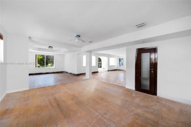 Mediterranean masterpiece built in 1936, full of old charm and on La Gorce Country Club in Florida - for sale on GolfHomes.com, golf home, golf lot