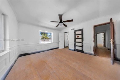 Mediterranean masterpiece built in 1936, full of old charm and on La Gorce Country Club in Florida - for sale on GolfHomes.com, golf home, golf lot