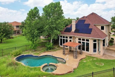 Put this custom home with a sparkling Pool and Spa at the top of on Buffalo Creek Golf Club in Texas - for sale on GolfHomes.com, golf home, golf lot