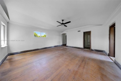 Mediterranean masterpiece built in 1936, full of old charm and on La Gorce Country Club in Florida - for sale on GolfHomes.com, golf home, golf lot
