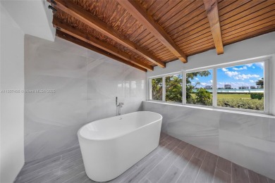 Mediterranean masterpiece built in 1936, full of old charm and on La Gorce Country Club in Florida - for sale on GolfHomes.com, golf home, golf lot