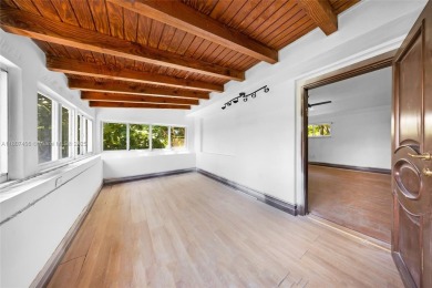 Mediterranean masterpiece built in 1936, full of old charm and on La Gorce Country Club in Florida - for sale on GolfHomes.com, golf home, golf lot