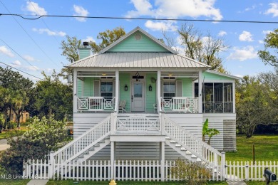 Welcome to your ideal coastal getaway nestled in the heart of on Pass Christian Isles Golf Club in Mississippi - for sale on GolfHomes.com, golf home, golf lot