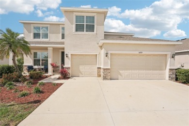 Stunning 4-Bedroom Pond View Home in Gated Star Farms at on Esplanade Golf and Country at Lakewood Ranch in Florida - for sale on GolfHomes.com, golf home, golf lot