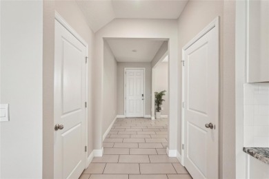 Stunning 4-Bedroom Pond View Home in Gated Star Farms at on Esplanade Golf and Country at Lakewood Ranch in Florida - for sale on GolfHomes.com, golf home, golf lot