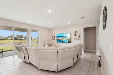 Stunning 4-Bedroom Pond View Home in Gated Star Farms at on Esplanade Golf and Country at Lakewood Ranch in Florida - for sale on GolfHomes.com, golf home, golf lot