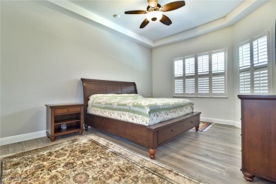 Step inside to a beautifully FURNISHED and updated interior on Shadow Wood Preserve in Florida - for sale on GolfHomes.com, golf home, golf lot