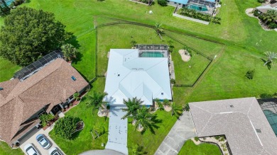 Welcome to your dream home in the heart of Punta Gorda. Step on Deep Creek Golf Club in Florida - for sale on GolfHomes.com, golf home, golf lot