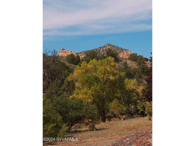 Welcome to Las Piedras, surrounded by the Red Rocks of Sedona is on Canyon Mesa Country Club in Arizona - for sale on GolfHomes.com, golf home, golf lot