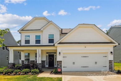 This beautifully designed 3-story home is ideal for entertaining on Fox Den Country Club in North Carolina - for sale on GolfHomes.com, golf home, golf lot