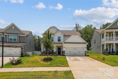 This beautifully designed 3-story home is ideal for entertaining on Fox Den Country Club in North Carolina - for sale on GolfHomes.com, golf home, golf lot