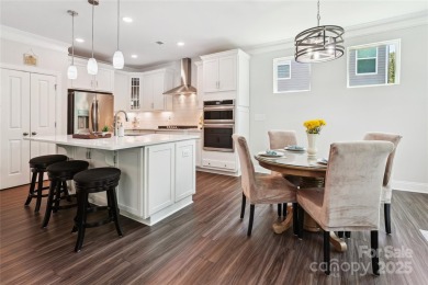 This beautifully designed 3-story home is ideal for entertaining on Fox Den Country Club in North Carolina - for sale on GolfHomes.com, golf home, golf lot