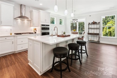 This beautifully designed 3-story home is ideal for entertaining on Fox Den Country Club in North Carolina - for sale on GolfHomes.com, golf home, golf lot