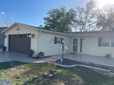 CHECK OUT THIS HOME in the sought after 55+ Gated Community of on Water Oak Country Club Estates in Florida - for sale on GolfHomes.com, golf home, golf lot