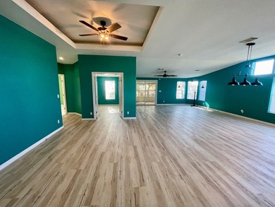 CHECK OUT THIS HOME in the sought after 55+ Gated Community of on Water Oak Country Club Estates in Florida - for sale on GolfHomes.com, golf home, golf lot